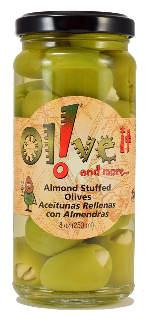 Almond stuffed olives in a jar, showcasing their green color and delicate almond filling, perfect for gourmet snacking or appetizers